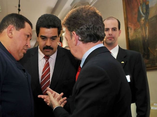 Santos reunido con Maduro y Chávez. Foto: Colprensa
