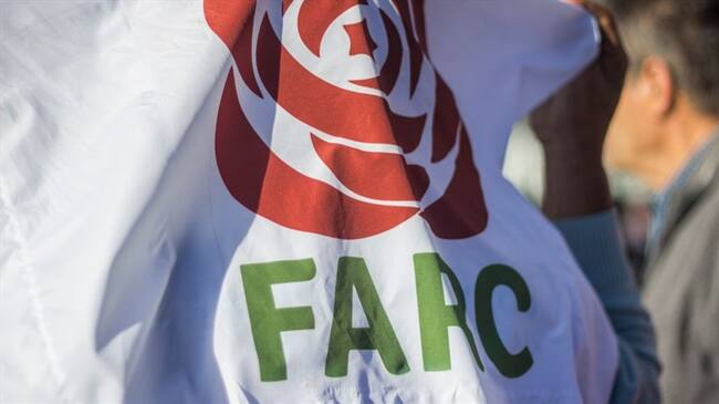 Durante un evento en el Centro de Memoria Histórica, la senadora del partido Farc, Sandra Ramírez le pidió un abrazo a una víctima de la guerrilla. Foto: Getty Images