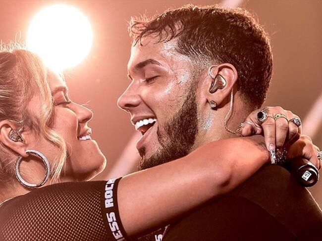 Anuel AA se tatuó a Karol G en su espalda. Foto: Agencia AFP