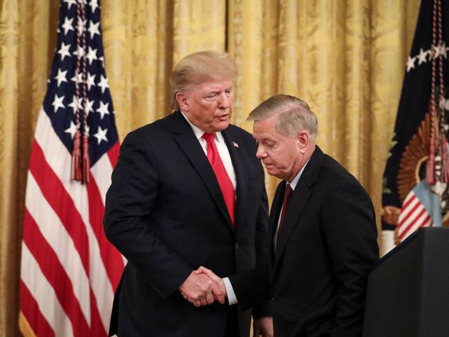 Donald Trump y Lindsey Graham. (Photo by Drew Angerer/Getty Images)