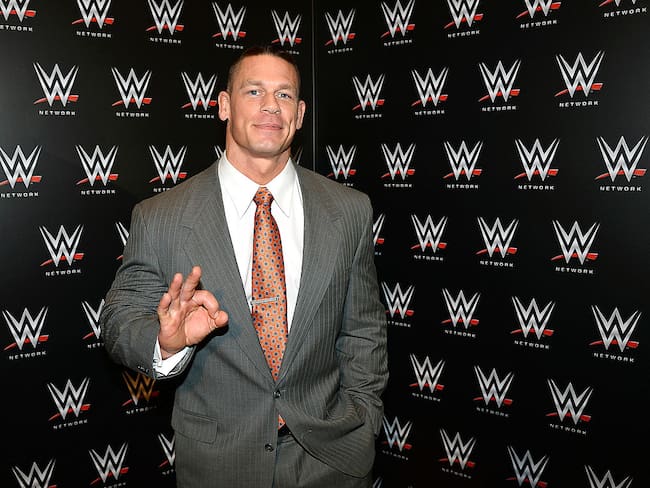 LAS VEGAS, NV - JANUARY 08:  WWE wrestler John Cena appears at a news conference announcing the WWE Network at the 2014 International CES at the Encore Theater at Wynn Las Vegas on January 8, 2014 in Las Vegas, Nevada. The network will launch on February 24, 2014 as the first-ever 24/7 streaming network, offering both scheduled programs and video on demand. The USD 9.99 per month subscription will include access to all 12 live WWE pay-per-view events each year. CES, the world&#039;s largest annual consumer technology trade show, runs through January 10 and is expected to feature 3,200 exhibitors showing off their latest products and services to about 150,000 attendees.  (Photo by Ethan Miller/Getty Images)