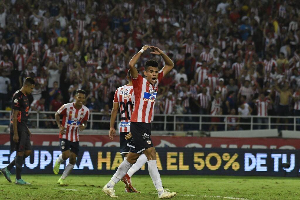 BARRANQUILLA, COLOMBIA - DECEMBER 08: Luis Diaz of Atletico Junior, celebrates after scoring the first goal of his team during the first leg final match between Junior and Independiente Medellin as part of Torneo Clausura of Liga Aguila 2018 at Metropolitano Roberto Melendez Stadium on December 08, 2018 in Barranquilla, Colombia. (Photo by Luis Ramirez/Getty Images)