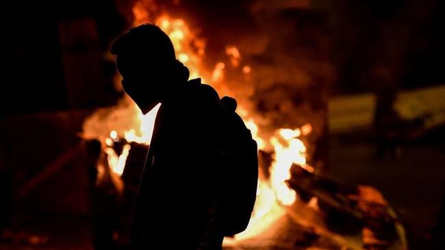 La Policía Nacional, junto a la Fiscalía General de la Nación, logró la captura de 25 personas. Foto: Getty Images / LUIS ROBAYO