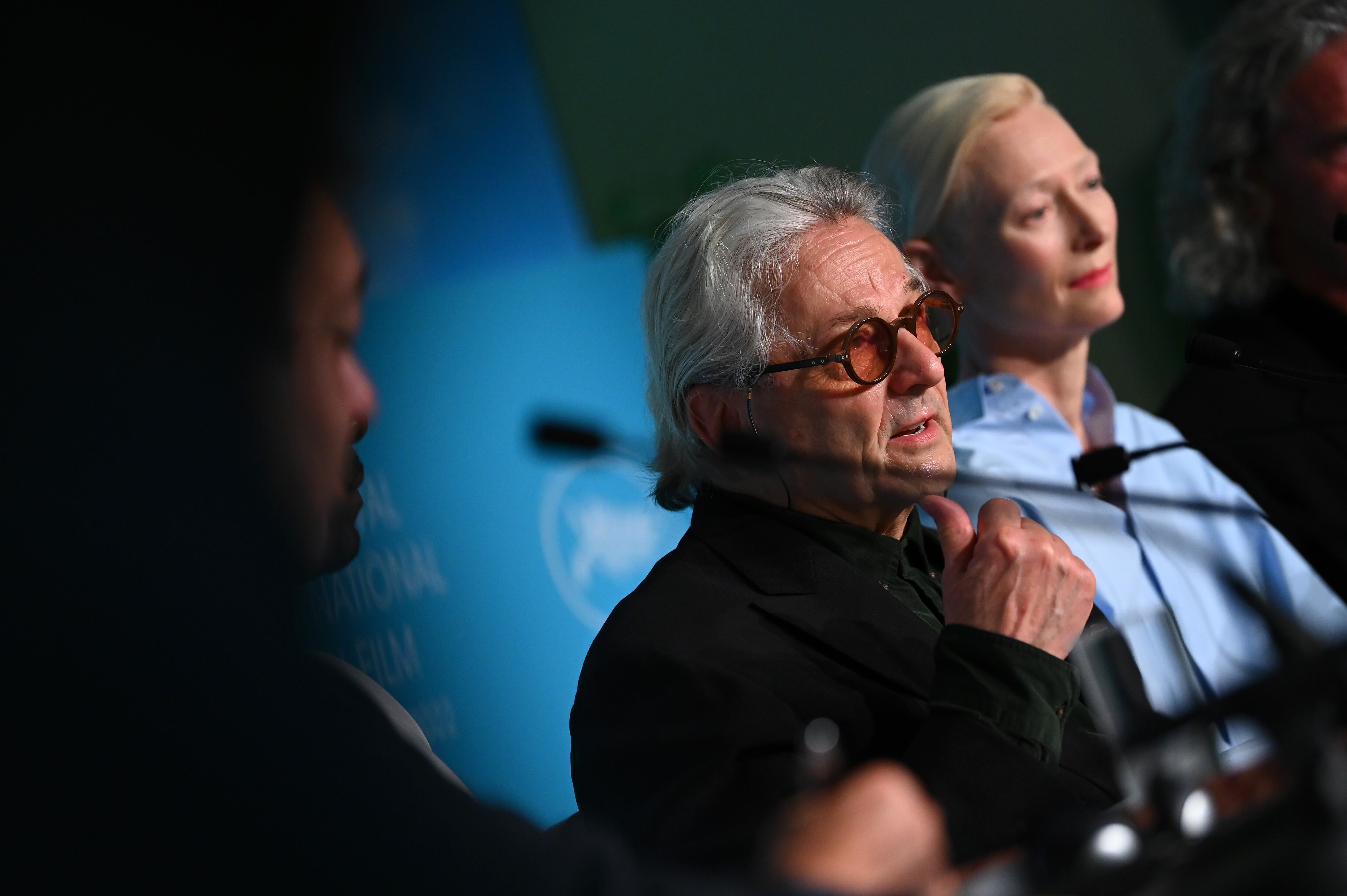 CANNES, FRANCE - MAY 21: Director and screenwriter George Miller (C) and Tilda Swinton attend the press conference for "Three Thousand Years of Longing" during the 75th annual Cannes film festival at Palais des Festivals on May 21, 2022 in Cannes, France. (Photo by Joe Maher/Getty Images)