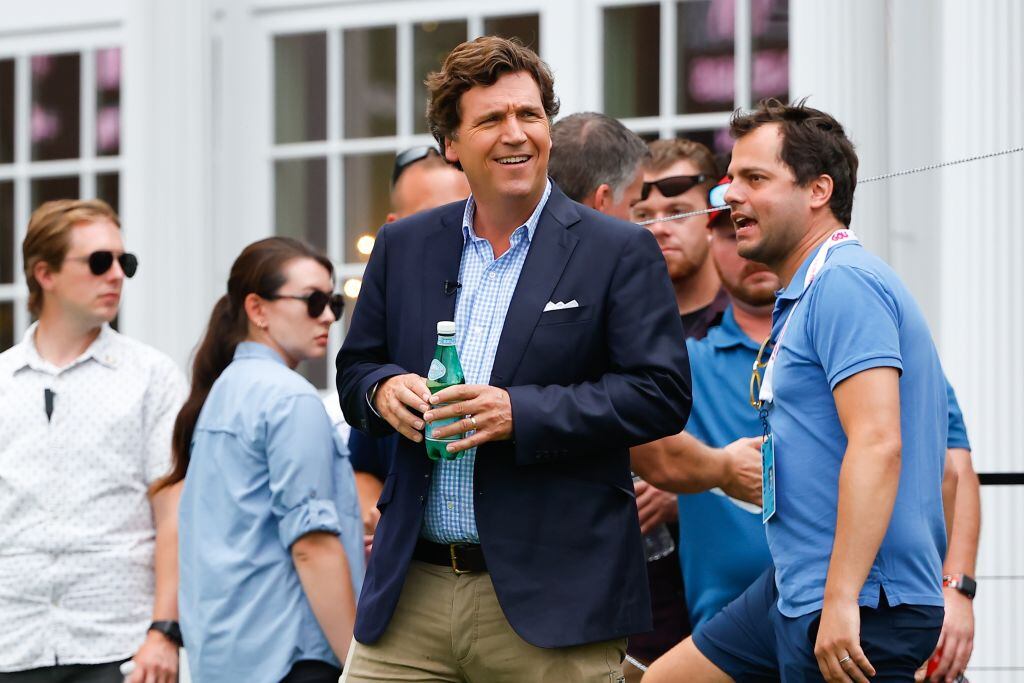 BEDMINSTER, NJ - JULY 31: Tucker Carlson of Fox News at the 16th tee during the 3rd round of the LIV Golf Invitational Series Bedminster on July 31, 2022 at Trump National Golf Club in Bedminster, New Jersey. (Photo by Rich Graessle/Icon Sportswire via Getty Images)