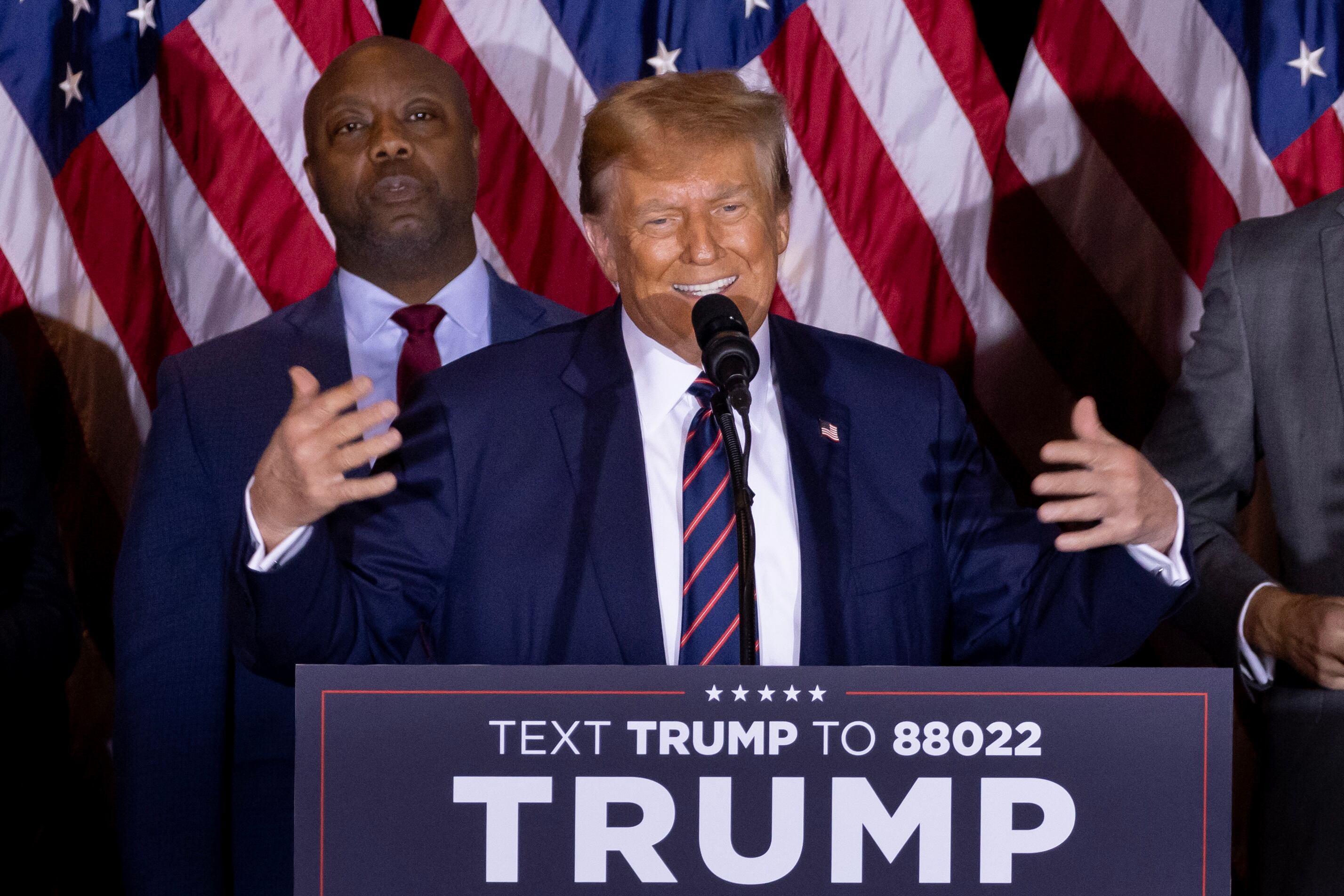 Nashua (United States), 24/01/2024.- Former US President Donald J. Trump delivers a speech after winning the New Hampshire primary, during an election night watch party in Nashua, New Hampshire, USA, 23 January 2024. The New Hampshire primary is the first primary in the nation and the second contest in the nominating process for the Republican presidential nomination. In the backround Republican Senator of South Carolina Tim Scott. EFE/EPA/MICHAEL REYNOLDS
