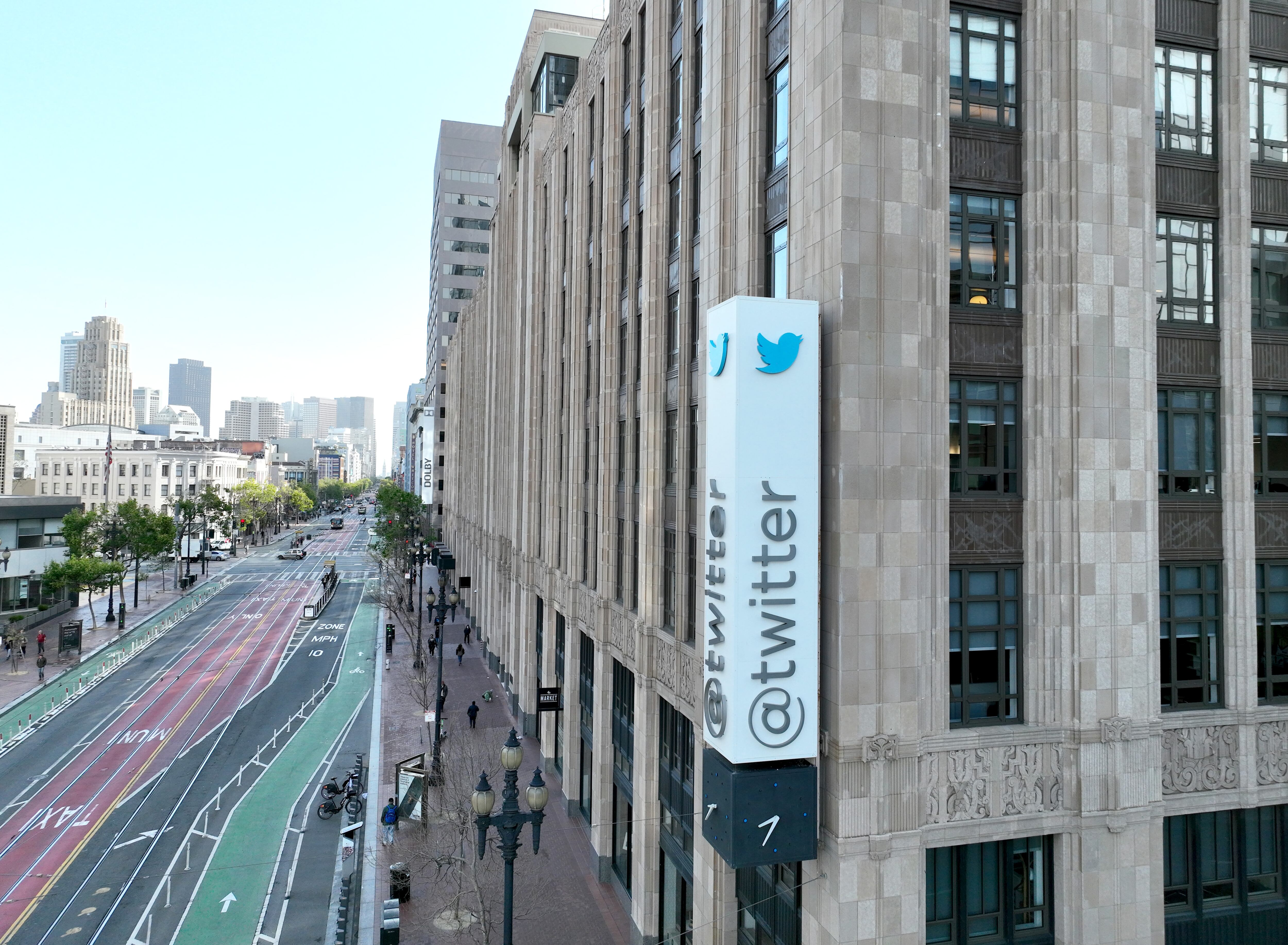 SAN FRANCISCO, CALIFORNIA - APRIL 27: In an aerial view, a sign is seen posted on the exterior of Twitter headquarters on April 27, 2022 in San Francisco, California. Billionaire Elon Musk, CEO of Tesla and Space X, reached an agreement to purchase social media platform Twitter for $44 billion. (Photo by Justin Sullivan/Getty Images)