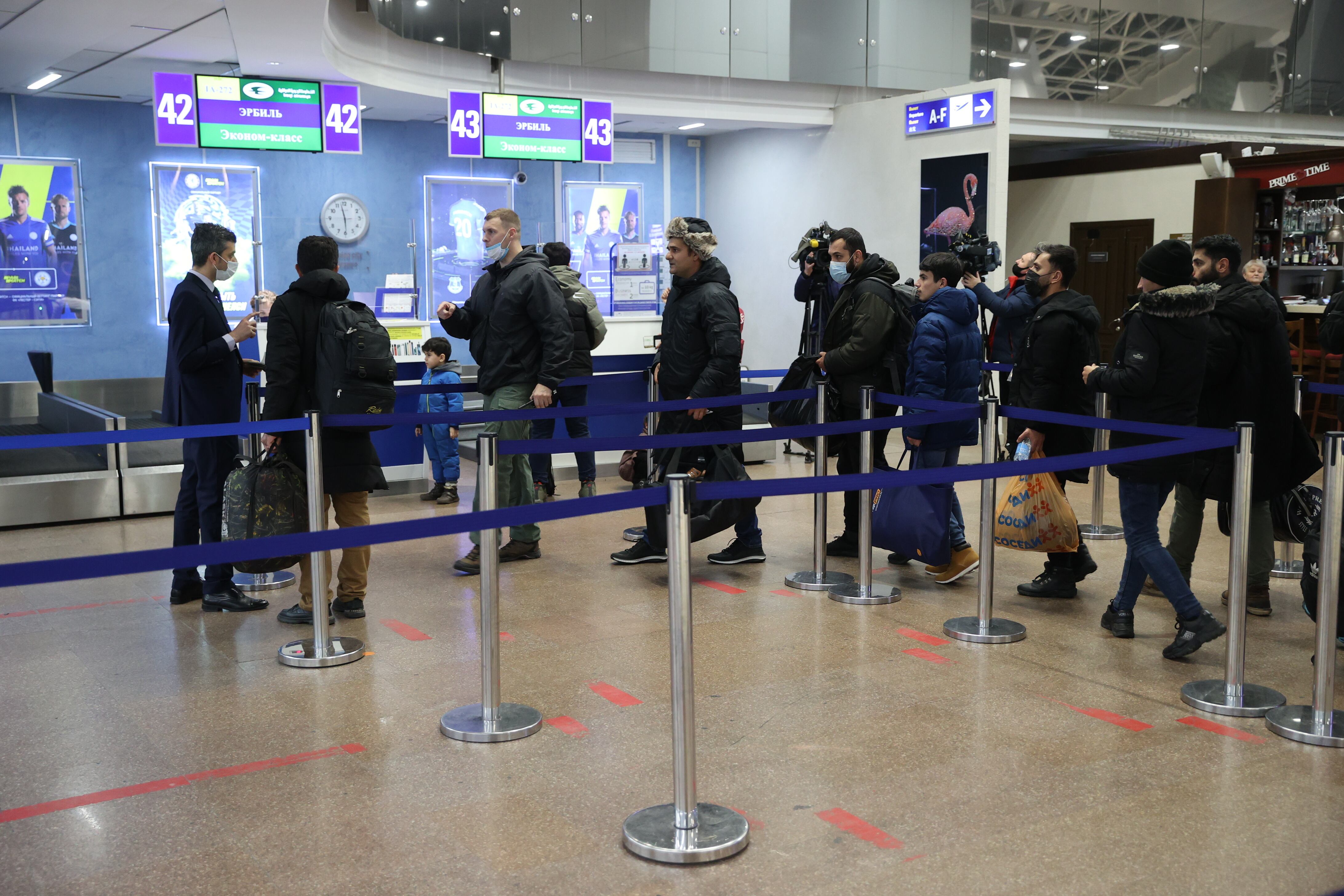 MINSK, BELARUS - NOVEMBER 25: A number of Iraqis who were waiting at the border between Belarus and Poland while seeking to enter the European Union arrive at Minsk Airport to return Iraq, in Minsk, Belarus on November 25, 2021. (Photo by Stringer/Anadolu Agency via Getty Images)