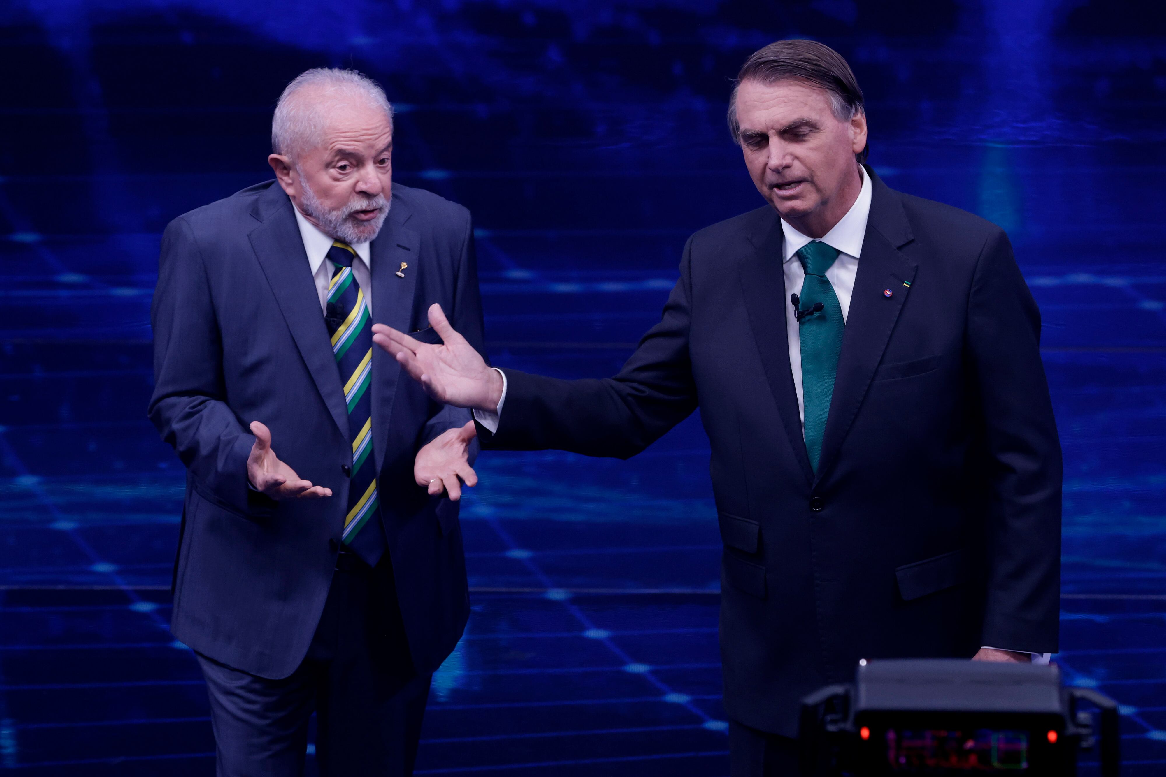 Luiz Inácio Lula Da Silva y Jair Bolsonaro. (Photo by Alexandre Schneider/Getty Images)