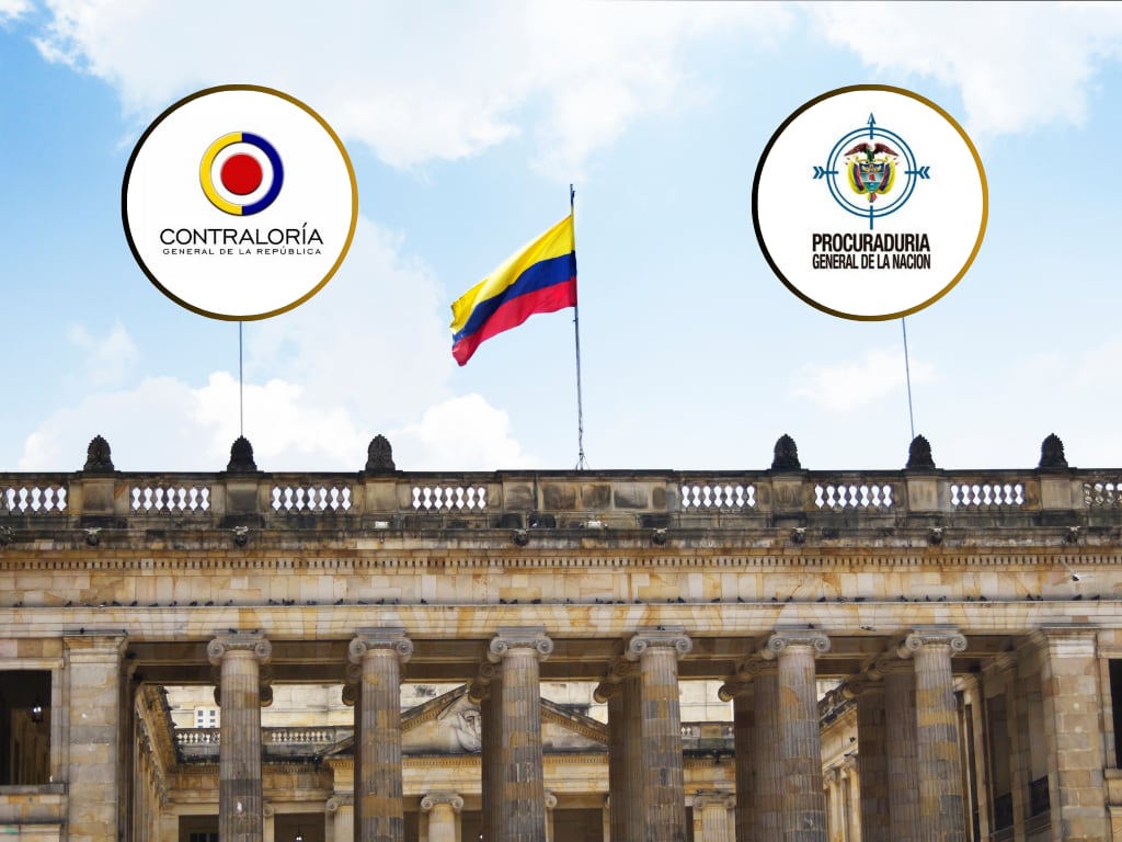Cámara de representantes en Bogotá con una bandera de Colombia y de fondo el logo de la Contralorpua General de la República y la Procuraduría General de la Nación (Fotos vía Getty Images)