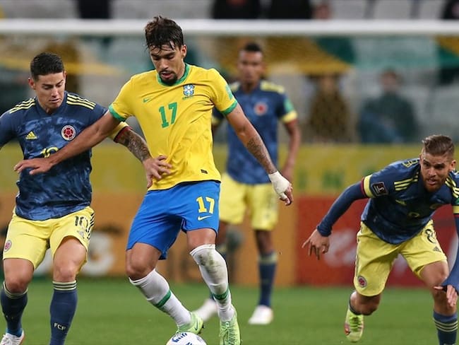 Futbolista colombiano James Rodríguez y brasileño Lucas Paquetá. Foto: Alexandre Schneider/Getty Images