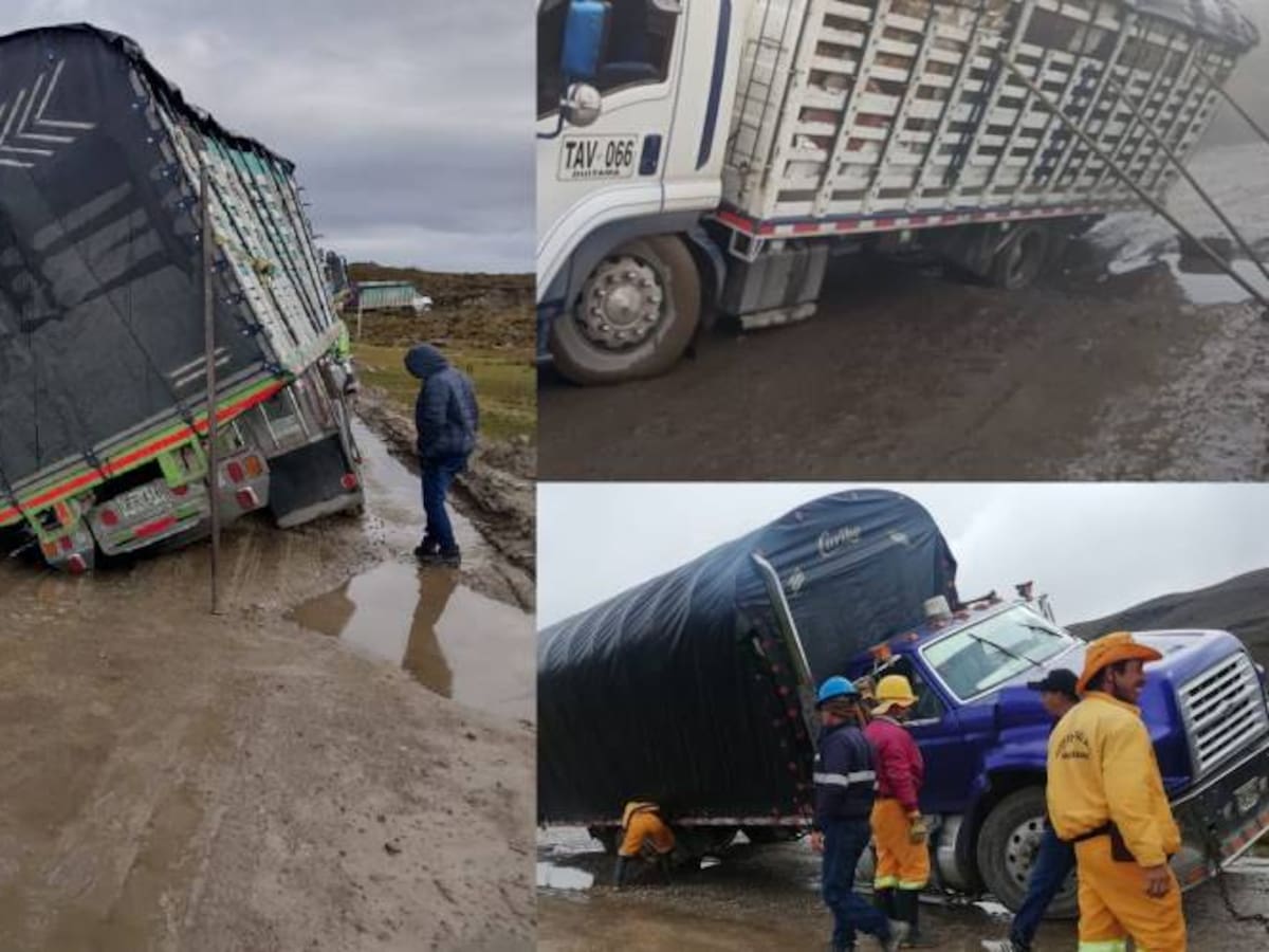 Carros hundidos en lodo y tierra en la troncal central del norte, en Santander