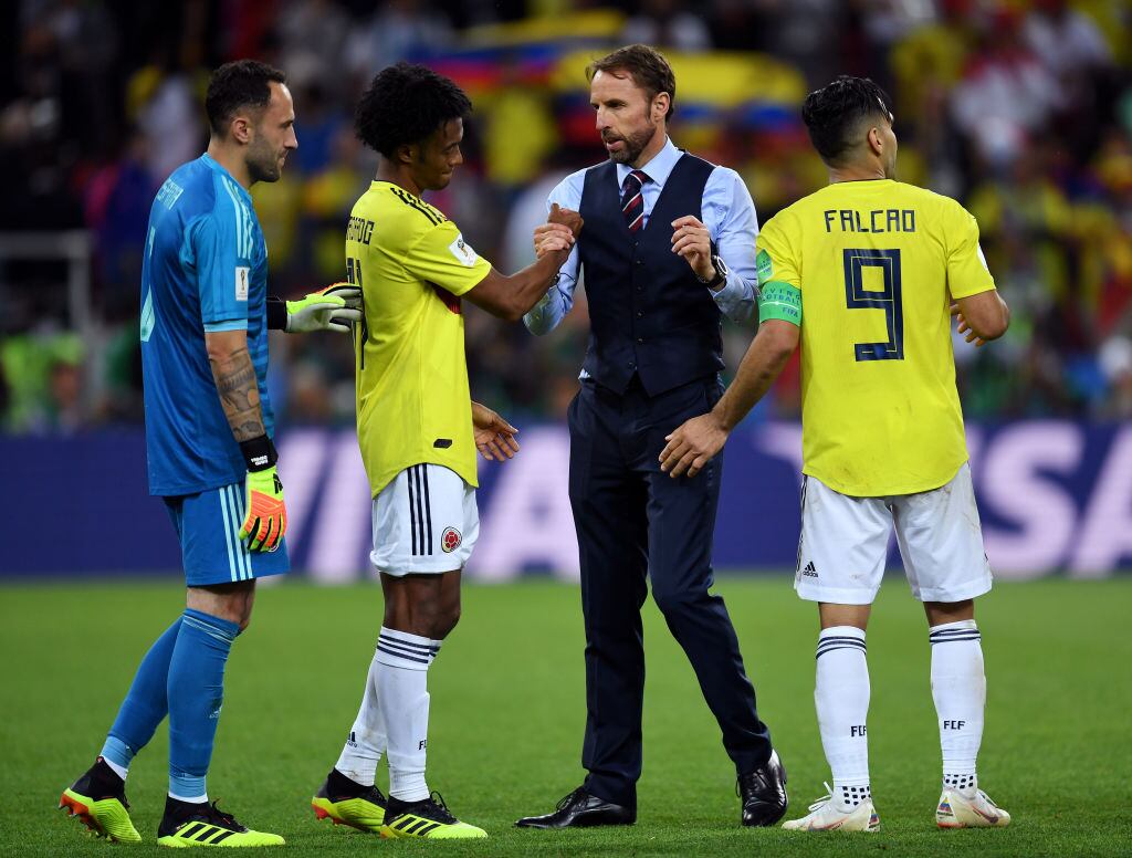 MOSCOW, RUSSIA - JULY 03:  Gareth Southgate consoles Colombia players following Colombia's defeat in the 2018 FIFA World Cup Russia Round of 16 match between Colombia and England at Spartak Stadium on July 3, 2018 in Moscow, Russia.  (Photo by David Ramos - FIFA/FIFA via Getty Images)