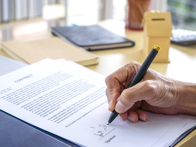 Signing Official Document Or Contract.