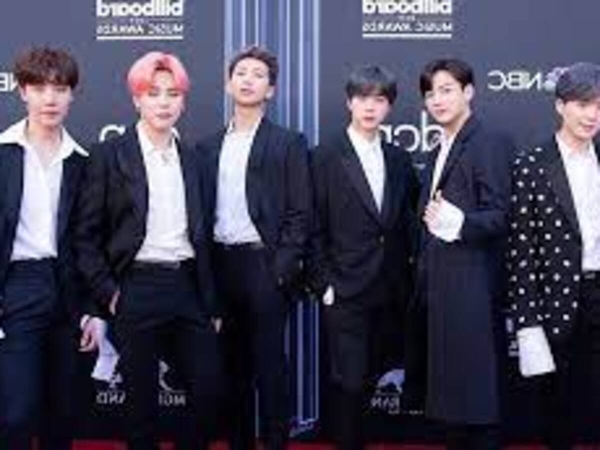 Tres miembros del grupo sensación de K-pop BTS dan positivo en covid-19