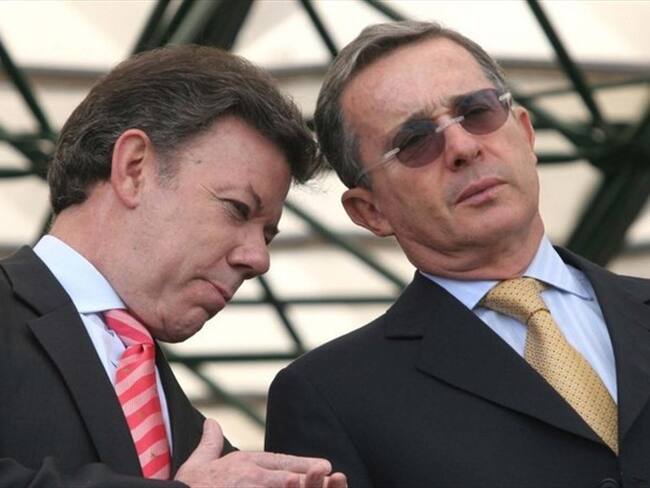 Juan Manuel Santos, presidente de la República y Álvaro Uribe, senador del Centro Democrático. Foto: Colprensa