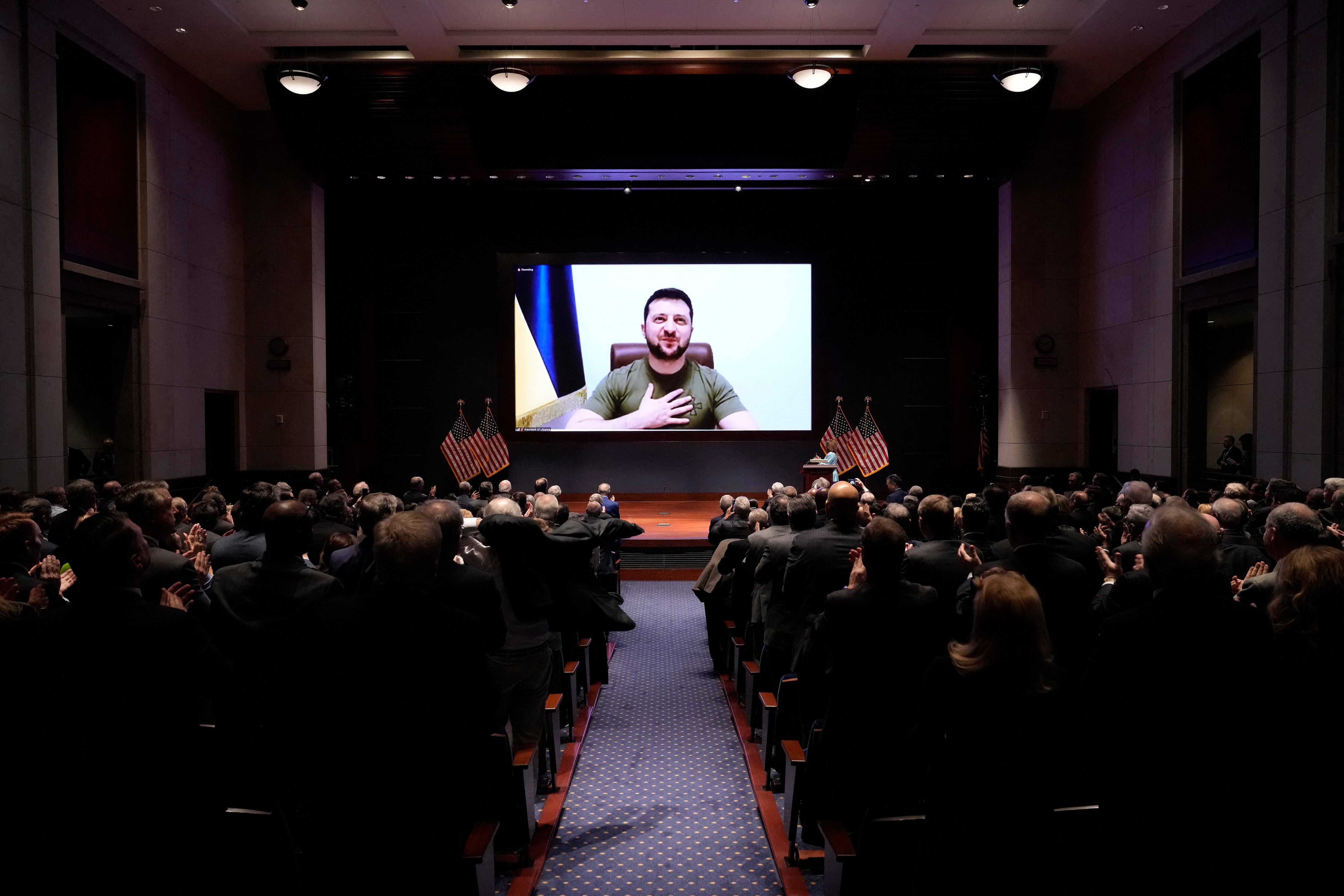 Ukrainian President Volodymyr Zelensky virtually addresses the US Congress on March 16, 2022, at the US Capitol Visitor Center Congressional Auditorium, in Washington, DC. (Photo by Drew Angerer / POOL / AFP)