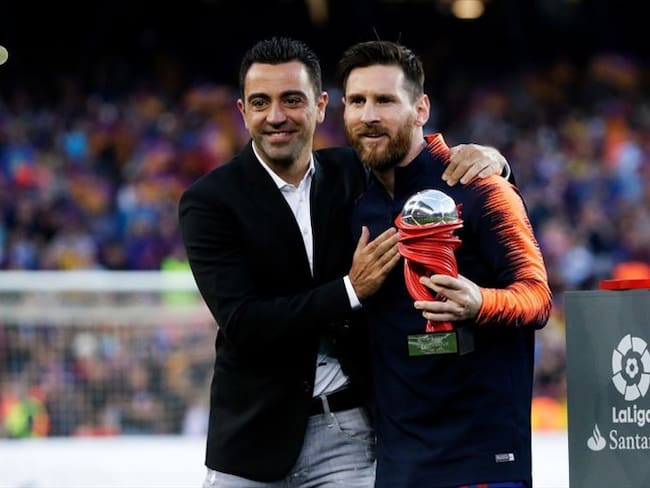 Lionel Messi y Xavi Hernández en un encuentro entre el Barcelona y el Real Sociedad en la Liga Santander. Foto: Getty Images