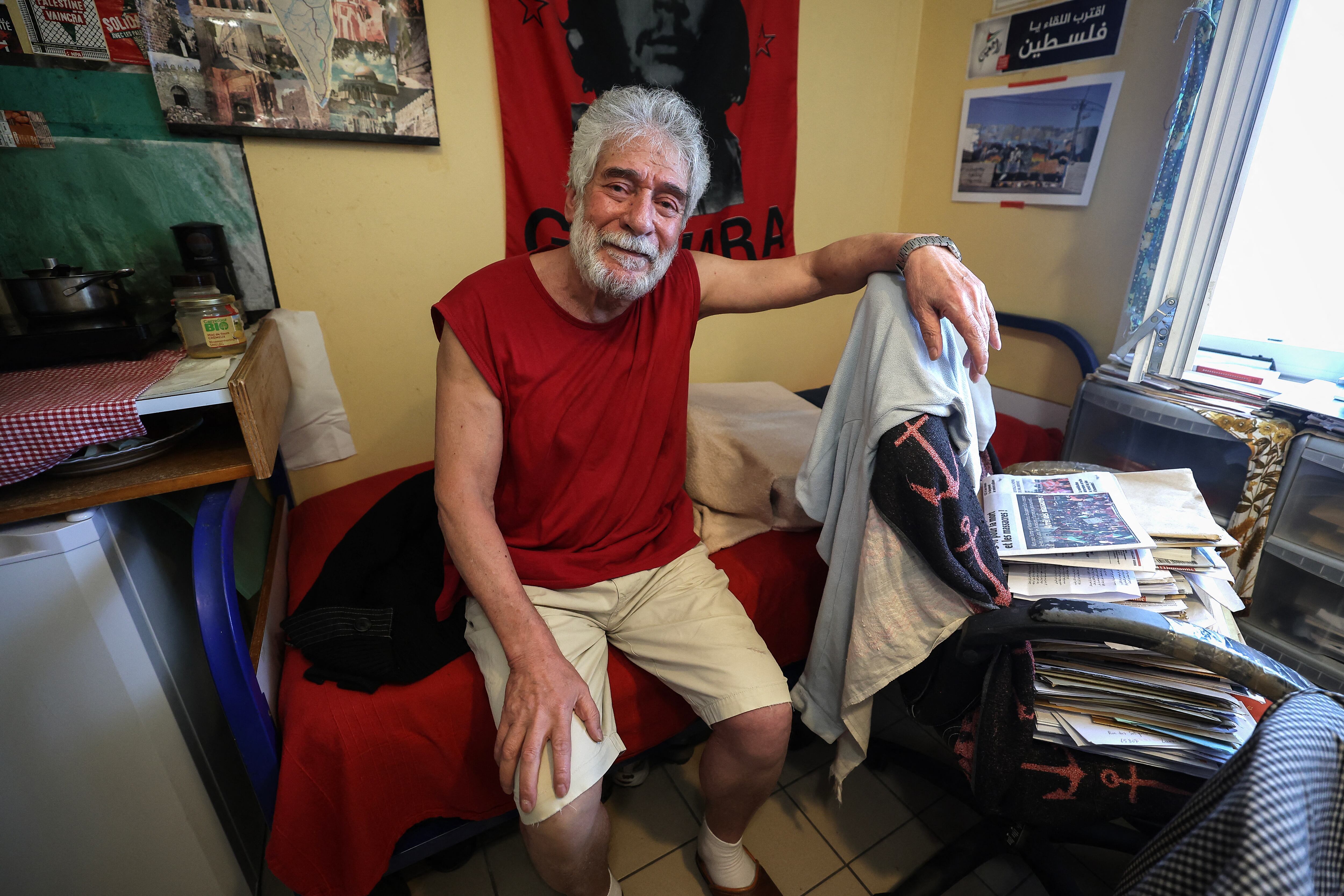 (FILES) This photograph taken during a visit of French leftist party La France Insoumise (LFI)'s MP Andree Taurinya shows pro-Palestinian Lebanese militant Georges Ibrahim Abdallah sitting in his prison cell in Lannemezan, southwestern France, on July 17, 2025, after an appeals court ordered his release. The Paris General Prosecutor's Office indicated on July 21, 2025 in a statement that it has filed an appeal in cassation against the release of the pro-Palestinian Lebanese activist Georges Abdallah, which will not, however, prevent him from leaving his French prison as planned on July 25, 2025 to return to Lebanon. (Photo by Valentine CHAPUIS / AFP)