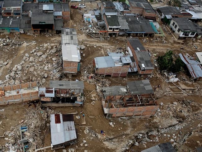 Vista aérea de un barrio afectado en Mocoa. Foto: Agencia EFE/LEONARDO MUÑOZ
