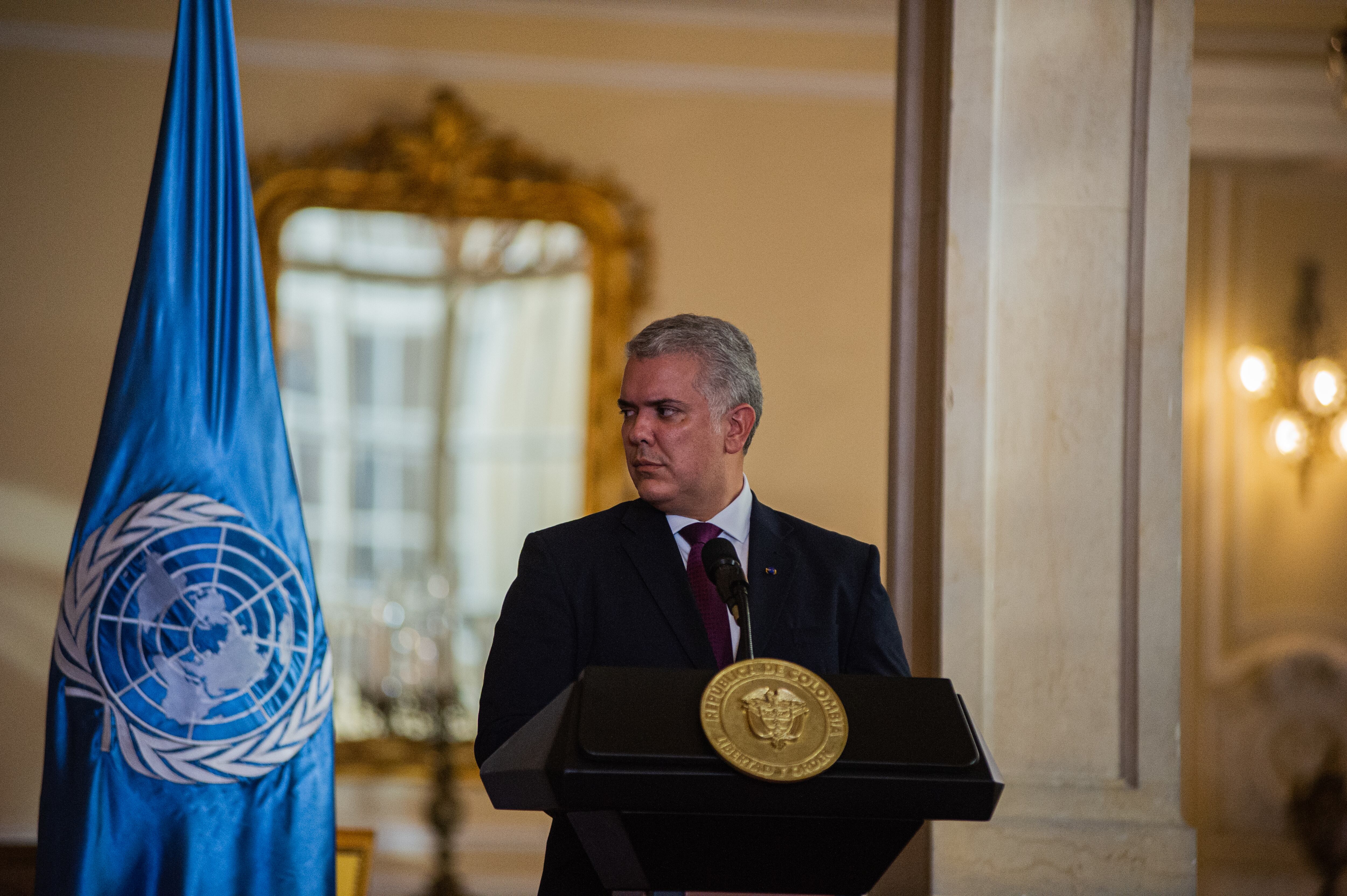 Colombia's president Ivan Duque speaks to the press at conference during the visit of the United Nations Secretary-General Antonio Guterres for the 5 year anniversary of the peace treaty between the Revolutionary Armed Forces of Colombia (FARC-EP) and the Colombian government back in 2016. In Bogota, Colombia on November 24, 2021. (Photo by Sebastian Barros/NurPhoto via Getty Images)
