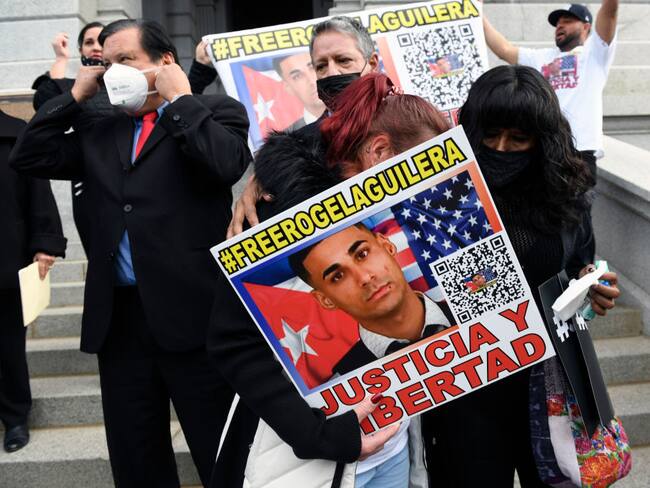 DENVER, CO - DECEMBER 22: during a rally for truck driver Rogel Aguilera-Mederos on the west steps of the state capitol on December 22, 2021 in Denver, Colorado. Community groups and advocates from across the state joined the family and legal team of Rogel Aguilera-Mederos at the Colorado State Capitol Building to call on Governor Jared Polis to take immediate action to reduce Mederos"u2019s sentence. Mederos was sentenced to 110 years in the accidental death of four people in a tragic I-70 traffic accident when his brakes failed. The sentencing judge in the case has publicly stated that he would likely not have imposed the sentence but was forced to follow Colorado mandatory sentencing laws, which require mandatory minimums for specified crimes and require sentences to be served consecutively not concurrently. More than 4 million people have signed a petition asking for Mederos"u2019s sentence to be commuted or reduced. Mederos has no criminal record, cooperated fully with investigators, and was not under the influence of drugs or alcohol at the time of the accident. Organizers said that the rally was in no way an attempt to minimize the tragic loss of life three years ago, but rather to call attention to the critical need for sentencing reform. (Photo by Helen H. Richardson/MediaNews Group/The Denver Post via Getty Images