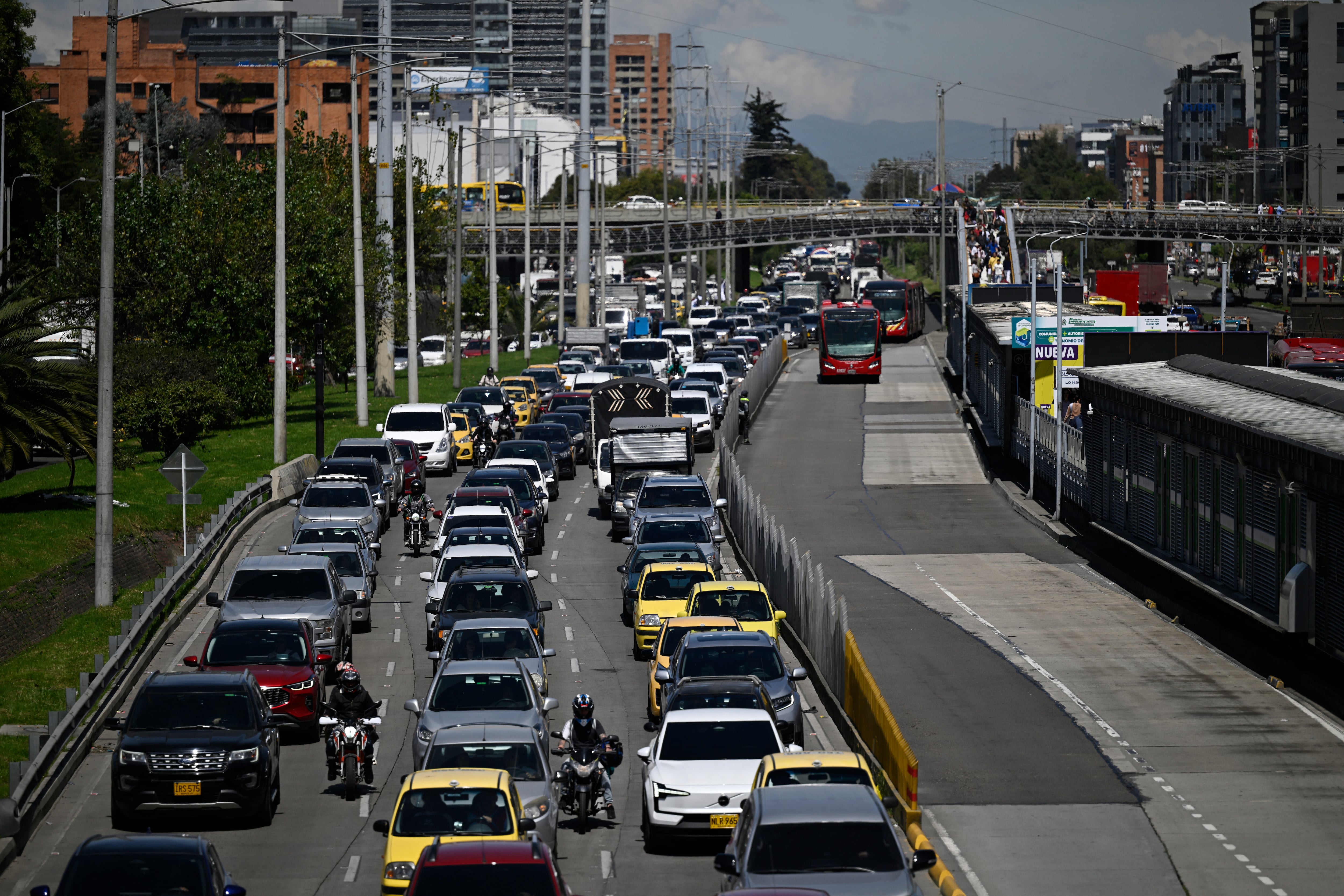 Vehicles are seen during a traffic jam in Bogota on December 11, 2024. (Photo by Pablo VERA / AFP) (Photo by PABLO VERA/AFP via Getty Images)