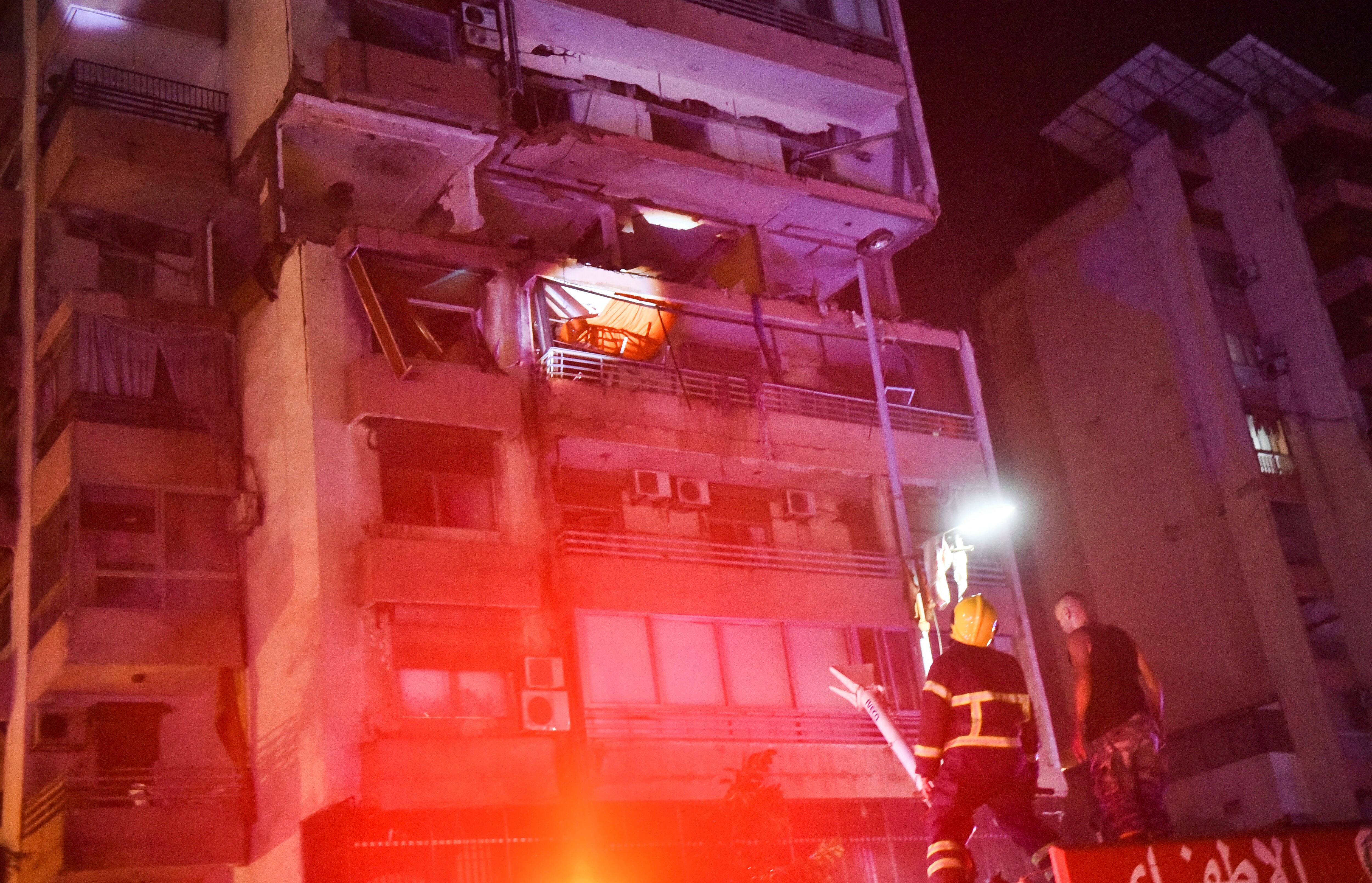 Bombardeo en edificio de Beirut. (Photo by Fadel ITANI / AFP)