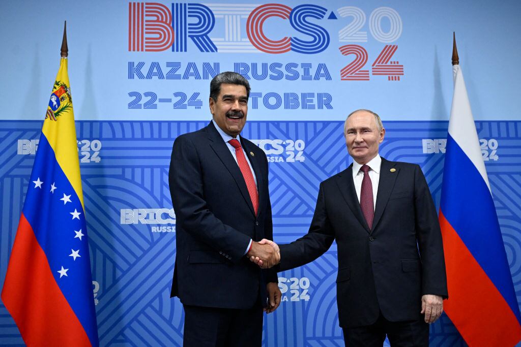 Vladimir Putin y Nicolas Maduro. I Foto: ALEXANDER NEMENOV/POOL/AFP via Getty Images.