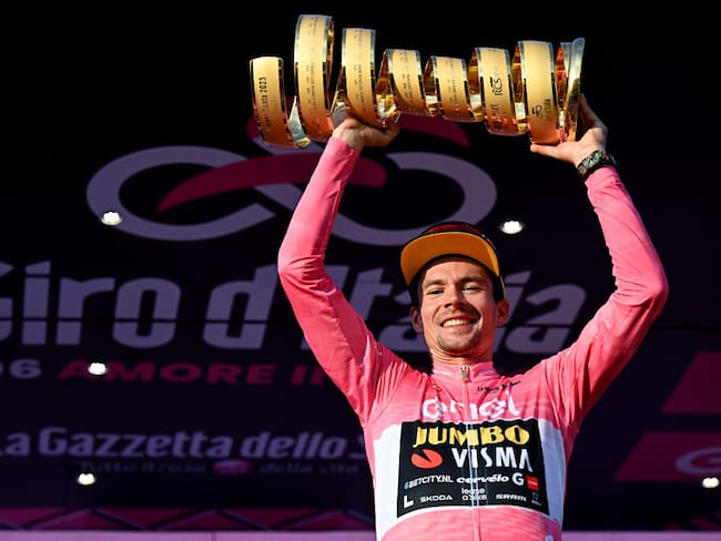 ROME, ITALY - MAY 28: Primož Roglič of Slovenia and Team Jumbo-Visma - Pink Leader Jersey celebrates at podium with the Trofeo Senza Fine as final overall race winner during the 106th Giro d&#039;Italia 2023, Stage 21 a 126km stage from Rome to Rome / #UCIWT / on May 28, 2023 in Rome, Italy. (Photo by Stuart Franklin/Getty Images,)