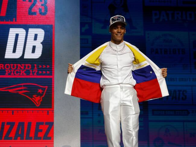 KANSAS CITY, MISSOURI - APRIL 27: Christian Gonzalez poses after being selected 17th overall by the New England Patriots during the first round of the 2023 NFL Draft at Union Station on April 27, 2023 in Kansas City, Missouri. (Photo by David Eulitt/Getty Images)