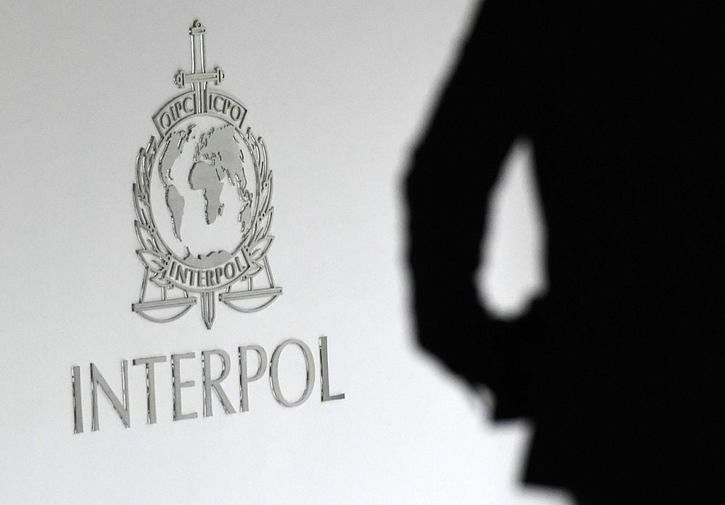 A logo at the newly completed Interpol Global Complex for Innovation building is seen during the inauguration opening ceremony in Singapore on April 13, 2015. The Interpol Global Centre for Innovation opened its doors with officials hoping it will strengthen global efforts to fight increasingly tech-savvy international criminals. AFP PHOTO / ROSLAN RAHMAN        (Photo credit should read ROSLAN RAHMAN/AFP via Getty Images)