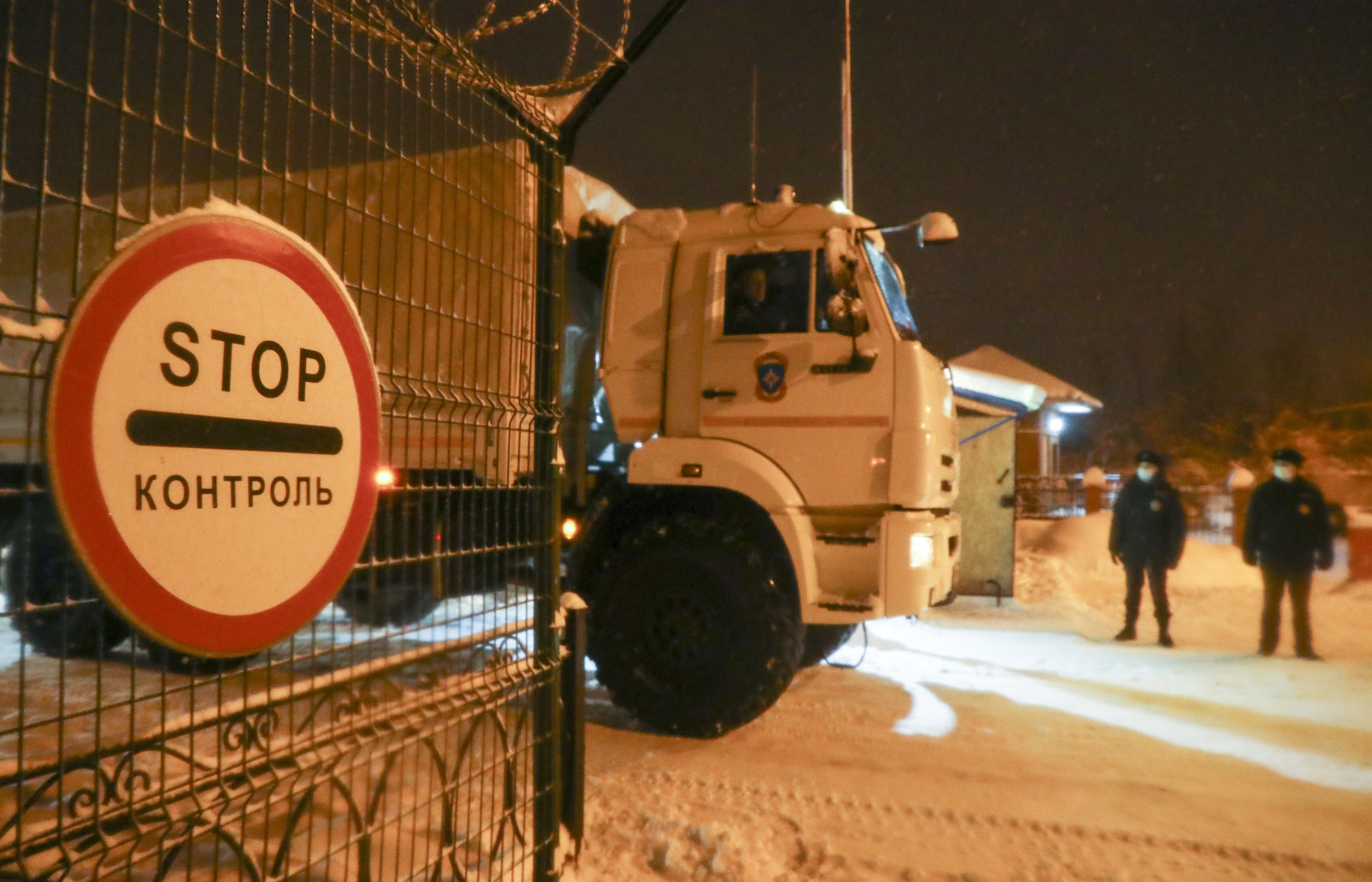 KEMEROVO REGION, RUSSIA  NOVEMBER 25, 2021: An emergency service vehicle at the Listvyazhnaya Mine in the Kuznetsk Coal Basin, Kemerovo Region, southwestern Siberia, where 11 people died and 35 more are missing. At least 40 people have been injured. The disaster was caused by coal dust catching fire in a vent, with the smoke spreading around the mine. There was no explosion and no damage was done to the coal mine. Founded in 2003 at the Inskaya Mine, the Listvyazhnaya Mine is a coal mining enterprise, which is part of the SDS-Ugol company. Maxim Kiselev/TASS (Photo by Maxim Kiselev\TASS via Getty Images)