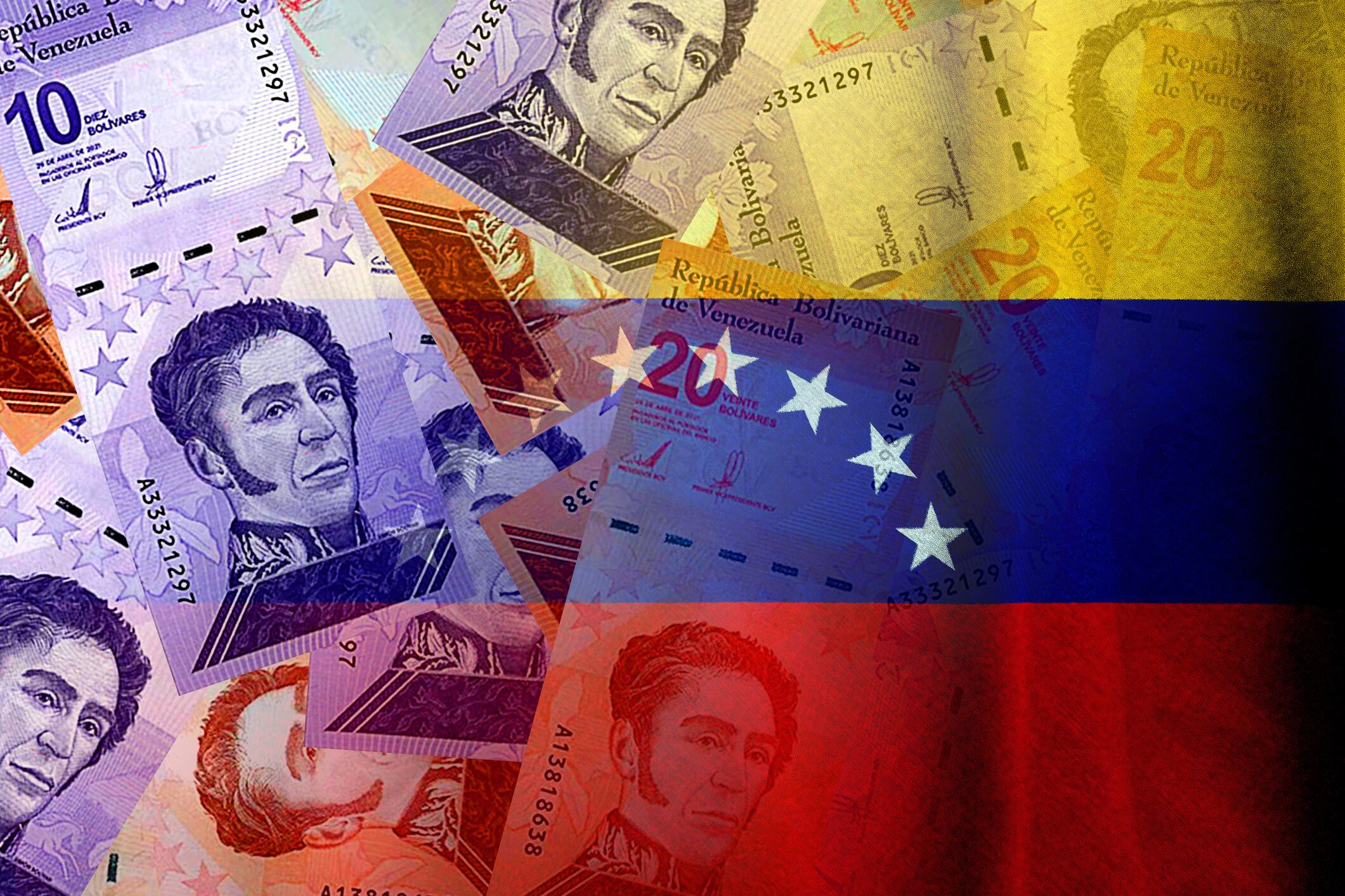 Bolívares cash bills and Venezuela flag (money, economy, finance, business, crisis, inflation)