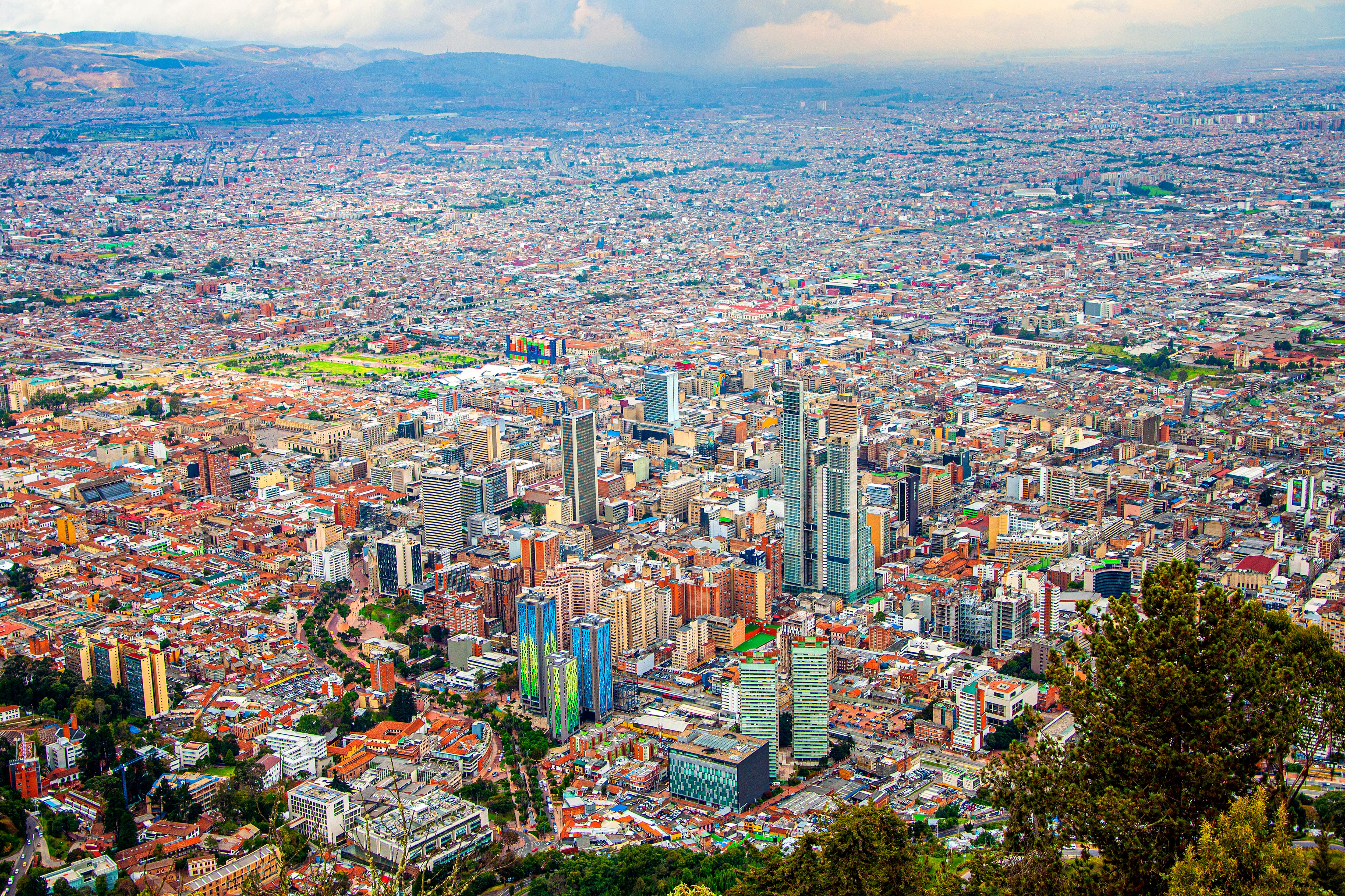 Bogota, Colombia. Panoramic view of the city from Cerro de Monserrate on a cloudy day.The Monserrate hill is the best known of the Eastern hills of Bogotá. Together with Guadalupe it is one of the tutelary hills of the city. Monserrate has an altitude of 3152 m and is located on the eastern mountain range.​