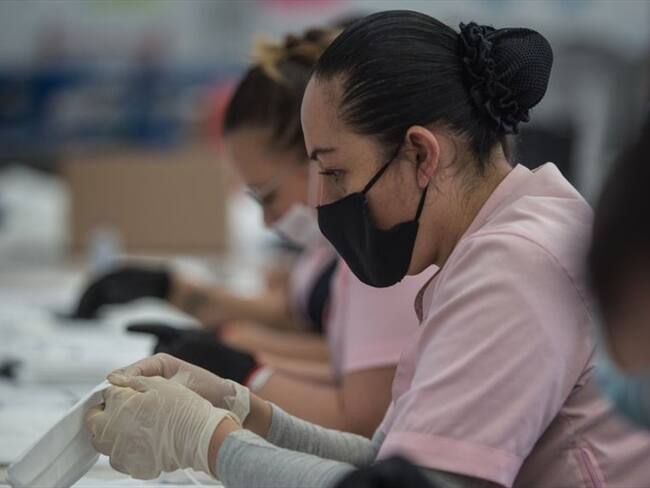 El presidente Iván Duque advirtió que hay un grave impacto económico del COVID-19 sobre las mujeres, especialmente en las rurales y madres cabeza de familia. Foto: Getty Images / JUANCHO TORRES