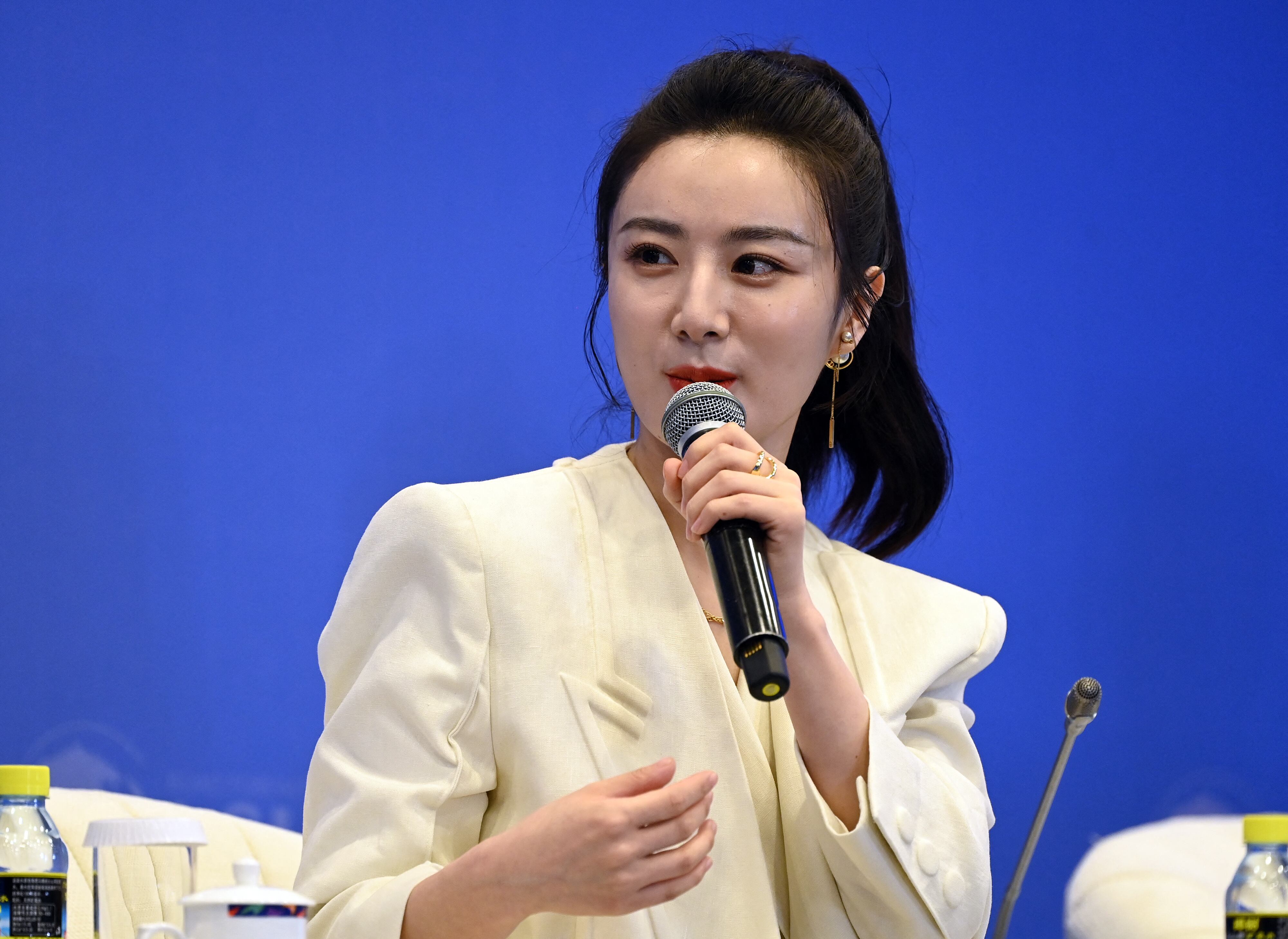 This photo taken on April 20, 2021 shows e-commerce livesreamer Huang Wei, also known as Viya, speaking during the Boao Forum for Asia (BFA) in Boao, in south China's Hainan province. - A Chinese influencer known as the "queen of livestreaming" has been ordered to pay 204 million USD for tax evasion, the biggest fine of its kind in Beijing's crackdown on celebrities. - China OUT (Photo by CNS / AFP) / China OUT (Photo by STR/CNS/AFP via Getty Images)