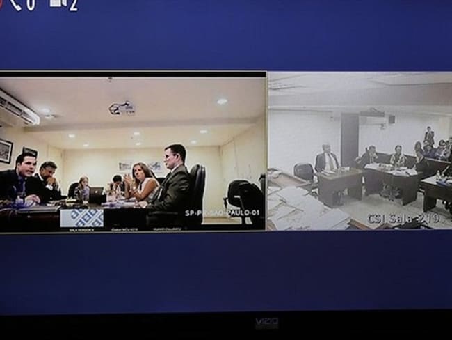 Los brasileños Luiz Antonio Bueno, Luiz Mameri, y Luiz Eduardo Da Rocha Suárez participan, vía videoconferencia, en el juicio que se sigue contra José Elías Melo por el caso Odebrecht.. Foto: Colprensa