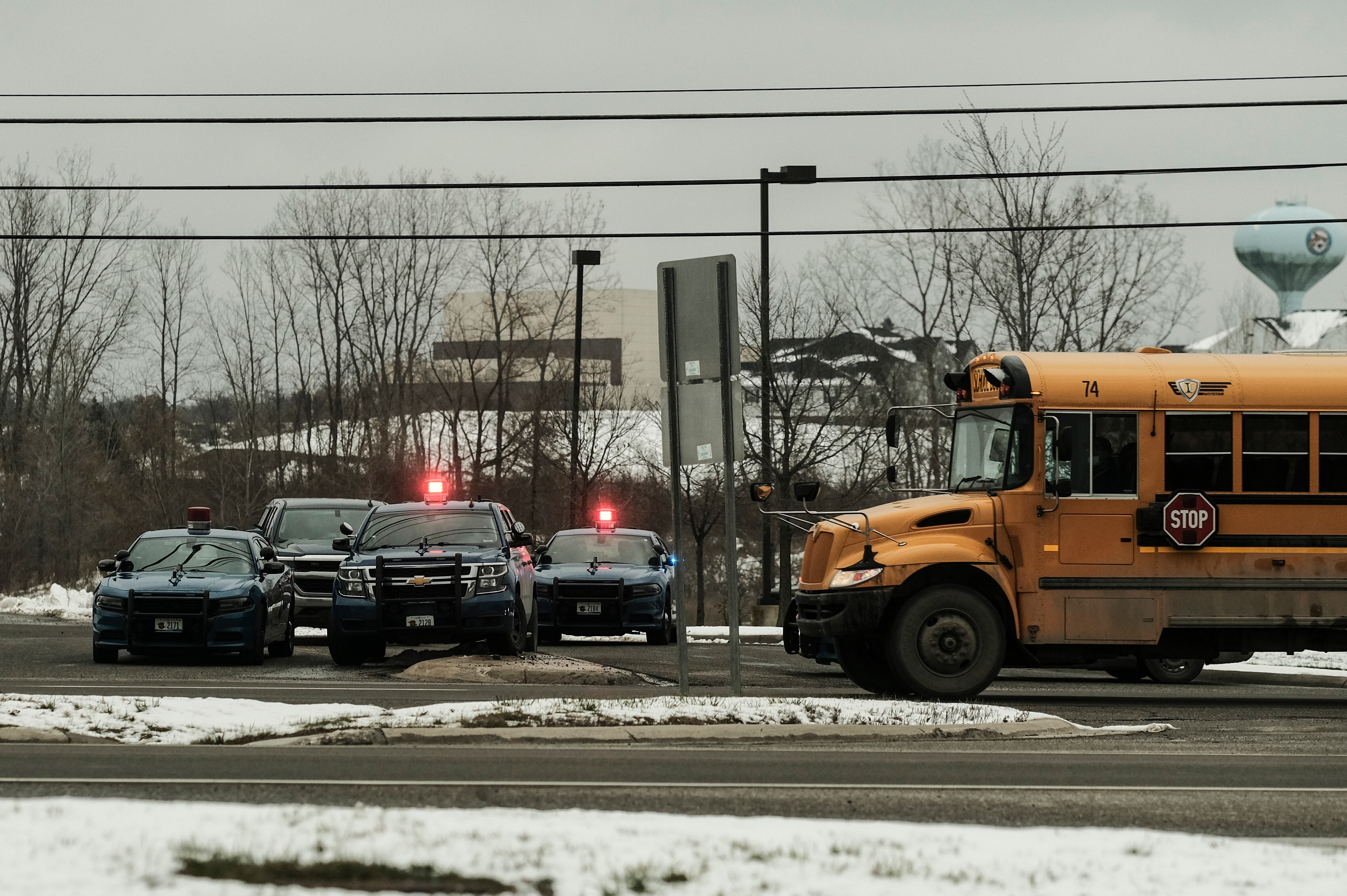 OXFORD, MI - NOVEMBER 30: Police cars restrict access to Oxford High School following a shooting on November 30, 2021 in Oxford, Michigan. (Photo by Matthew Hatcher/Getty Images)
