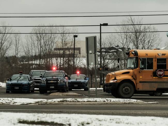 OXFORD, MI - NOVEMBER 30: Police cars restrict access to Oxford High School following a shooting on November 30, 2021 in Oxford, Michigan. (Photo by Matthew Hatcher/Getty Images)