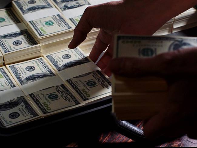 La Fiscalía informó que en las inspecciones se encontró el dinero en efectivo, en denominación de 100 dólares. Foto: Getty Images / KHUNTNOP ASAWACHIWANTORNGUL