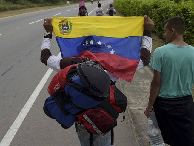 ¿Qué opina del estatuto para regularizar a migrantes venezolanos?. Foto: Getty Images / RAUL ARBOLEDA